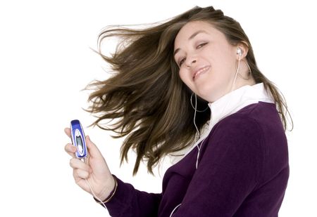 beautiful woman listening to music over white