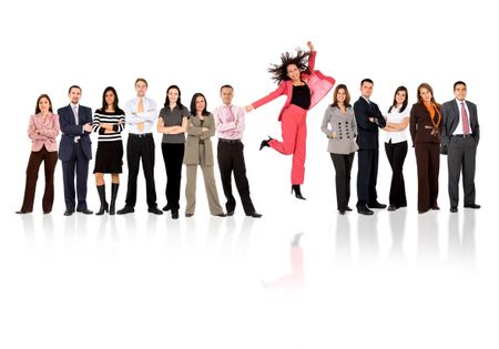 business woman jumping with her business team formed of young businessmen and businesswomen standing over a white background with reflections