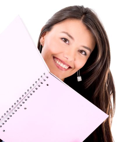 Very happy female student with a notebook - isolated over white