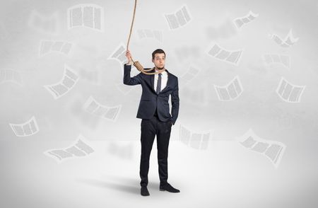 Young burnout businessman with flying documents concept