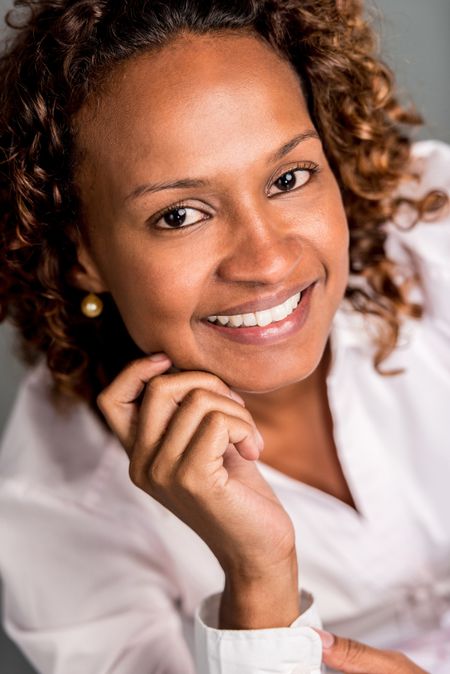 beautiful-african-american-woman-smiling-looking-139566527 Beautiful African American woman smiling and looking happy