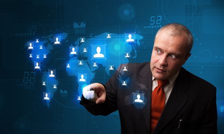 Businessman standing and choosing from social network map
