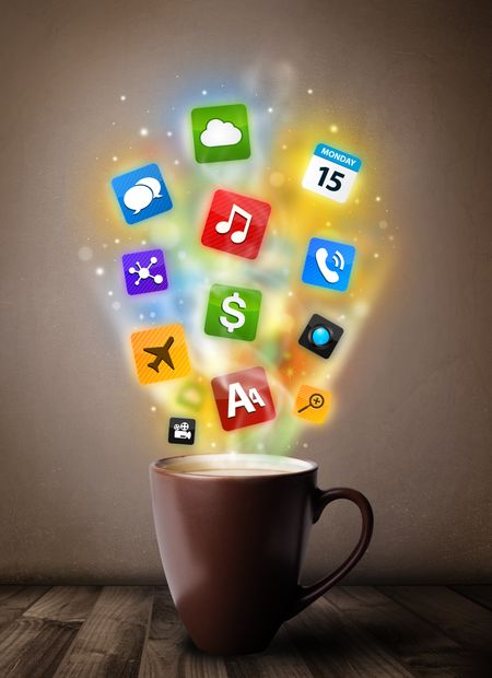 Coffee mug with colorful media icons, close up