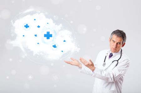 Proffesional doctor listening to abstract cloud with medical signs