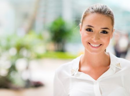Portrait of a happy business woman smiling