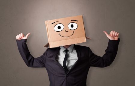 young-boy-standing-gesturing-cardboard-box-1406176820 Young boy standing and gesturing with a cardboard box on his head