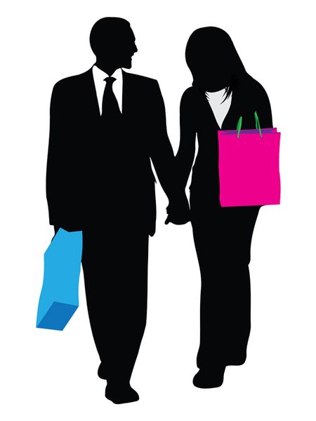 business couple walking forward silhouettes carrying shopping bags
