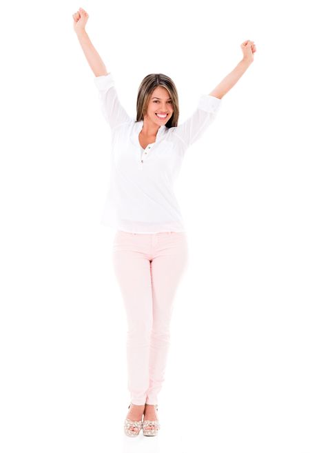 Successful woman with arms up looking happy - isolated over white