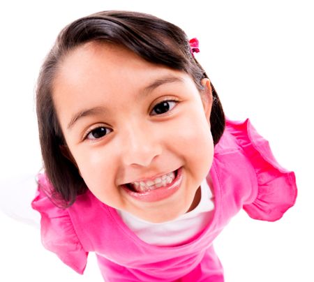 Cute little girl smiling - isolated over a white background