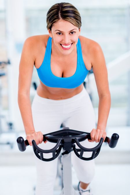 Fit woman working out at the gym