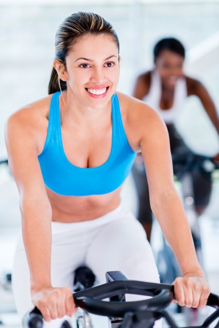 Happy woman at the gym