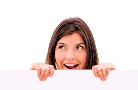 Surprised woman with a banner - isolated over a white background