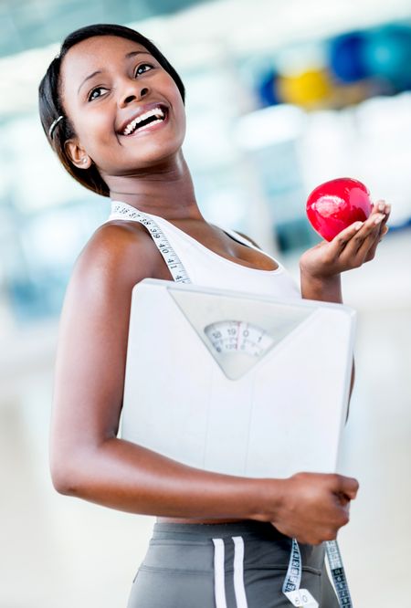 Fit woman eating healthy to lose weight