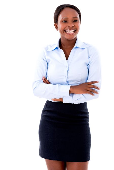 Happy business woman with arms crossed - isolated over white background