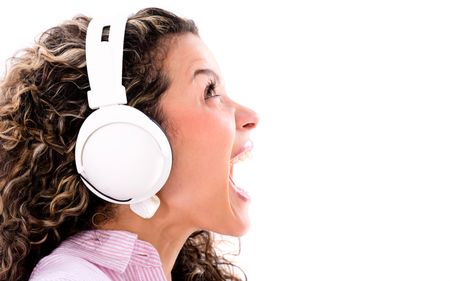 Woman listening to music and singing loud - isolated over white background