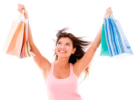 Very happy shopping woman with arms up - isolated over white backgorund