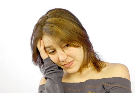 Woman worried with hand on her face