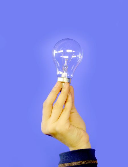 Bulb being hand by a hand