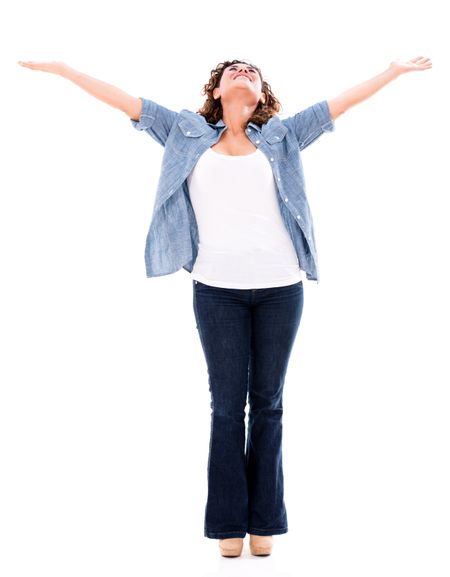 Happy woman with arms open - isolated over a white background