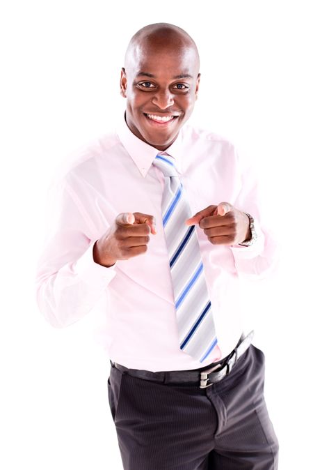 Excited business man pointing at the camera - isolated over white 