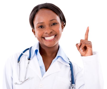 Happy female doctor pointing with her finger - isolated over white 