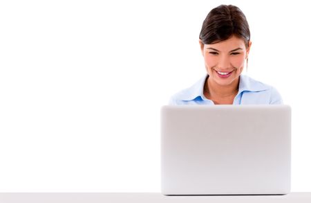 Business woman working online on a laptop computer Ã?Â¢?? isolated