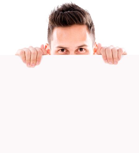 Man hiding behind a banner - isolated over white background 