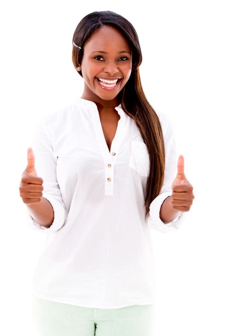 Woman with thumbs up smiling - isolated over a white background