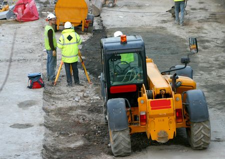 Builders discussing procedures