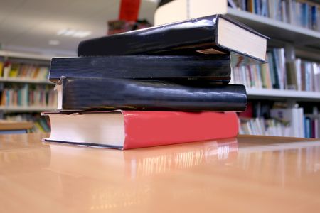 Books on a desk at a library