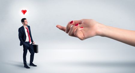 Foolish blind businessman in love going after big naked hand