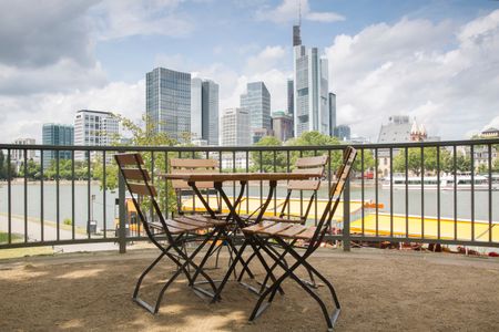 Cityscape and Cafe Table and Chairs, Frankfurt, Germany