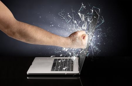 Hand hitting strongly laptop screen glass