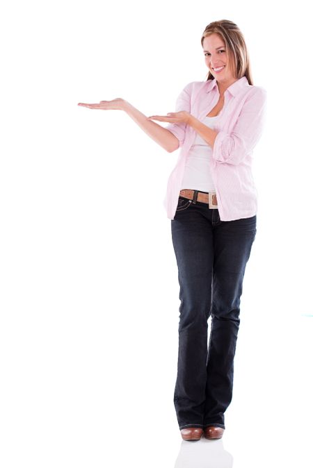 Welcoming woman with hands extended looking happy - isolated over white 