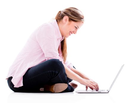 Woman working online on a laptop computer - isolated over white