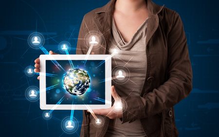 Young woman presenting 3d earth globe in modern tablet