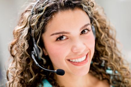 Customer service operator looking very friendly and smiling