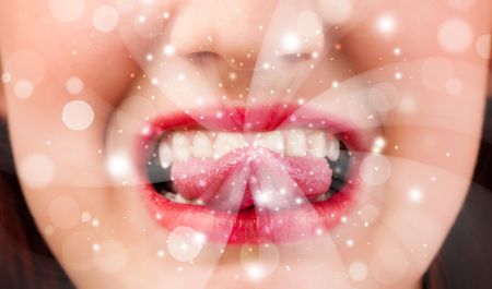 pretty-woman-lips-blowing-abstract-white-149302664 Pretty woman lips blowing abstract white lights - close up