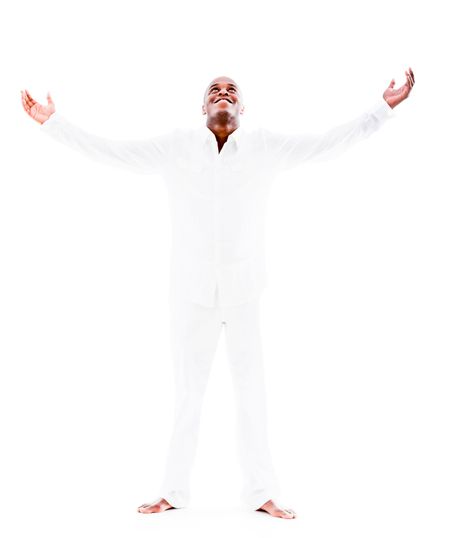 Yoga man with open arms looking happy - isolated over a white background