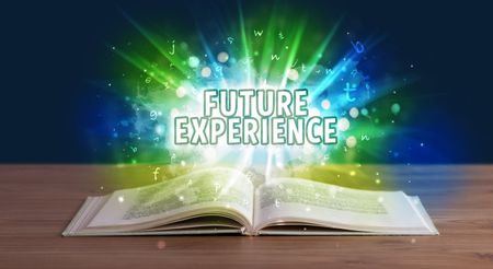 FUTURE EXPERIENCE inscription coming out from an open book, educational concept