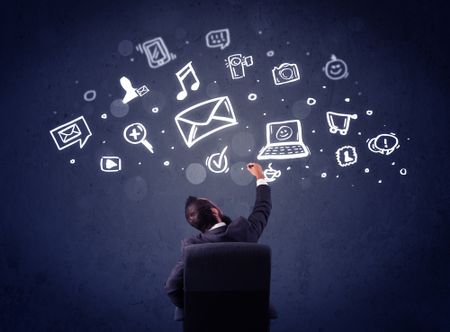 young-businessman-sitting-office-chair-sketched-150157994 Young businessman sitting in office chair with sketched multimedia icons above his head