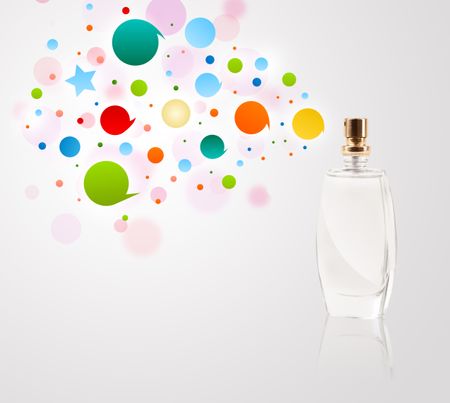 Perfume bottle spraying colorful bubbles