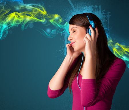 Pretty young woman with headphones listening to music, glowing smoke concept