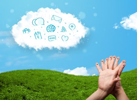Happy cheerful smiley fingers looking at cloud with blue social icons and smybols