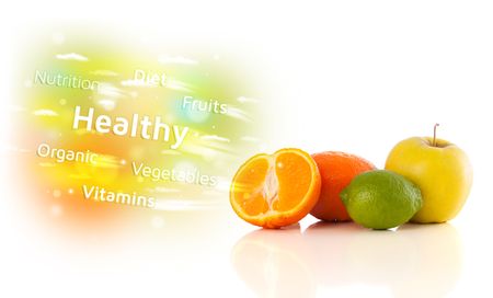 Colorful juicy fruits with healthy text and signs on white background 