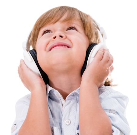 Cute little boy with headphones - isolated over a white background 
