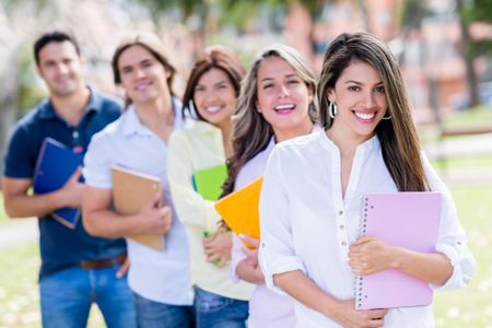 casual-group-students-looking-very-happy-151530080 Casual group of students looking very happy outdoors