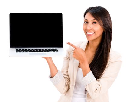 Happy woman holding a laptop - isolated over a white background 