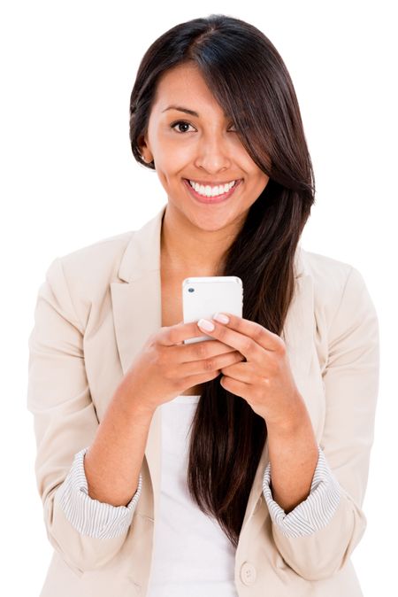 Woman texting on her cell phone - isolated over a white background