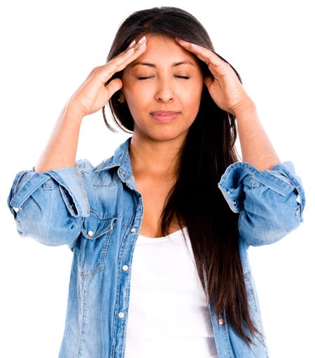 Stressed woman with a headache - isolated over a white background 